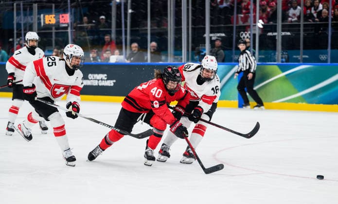 260216 Blayre Turnbull of Canada against Alina Muller and Nicole Vallario of Switzerland in the women s Ice hockey, Eishockey semifinal between Canada and Switzerland during day 10 of the 2026 Winter Olympics on February 16, 2026 in Milan. Photo: Emma Wallskog BILDBYRAN kod EW EW0639 ishockey ice hockey Olympic Games, Olympische Spiele, Olympia, OS olympics winter olympics os ol olympiska spel vinter-os olympiske leker milano cortina 2026 milan cortina 2026 milano cortina 2026 olympic games milano cortina 2026 winter olympic games milano cortina-os milano cortina-ol vinter-ol 10 bbeng kanada canada schweiz switzerland dam semifinal *** 260216 Blayre Turnbull of Canada against Alina Muller and Nicole Vallario of Switzerland in the women s ice hockey semifinal between Canada and Switzerland during day 10 of the 2026 Winter Olympics on February 16, 2026 in Milan Photo Emma Wallskog BILDBYRAN kod EW EW0639 ishockey ice hockey olympic games olympics winter olympics os ol olympiska spel vinter os olympiske leker milano cortina 2026 milan cortina 2026 milano cortina 2026 olympic games milano cortina 2026 winter olympic games milano cortina os milano cortina ol vinter ol 10 bbeng kanada canada schweiz switzerland dam semifinal  Copyright: EMMAxWALLSKOG BB260216EW089