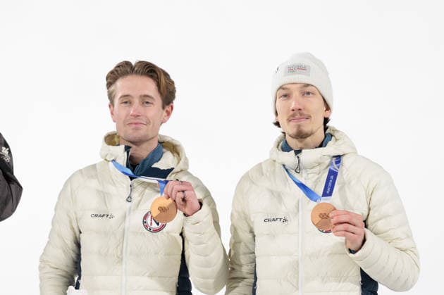 OLYMPICS - Winter Olympic Games, Olympische Spiele, Olympia, OS Milano Cortina 2026 PREDAZZO,ITALY,16.FEB.26 - OLYMPICS, Ski jumping, Skispringen, Ski, nordisch - Winter Olympic Games Milano Cortina 2026, large hill, Super Team, men, medal ceremony. Image shows Kristoffer Eriksen Sundal and Johann Andre Forfang (NOR).  GEPAxpictures xMatthiasxTrinkl