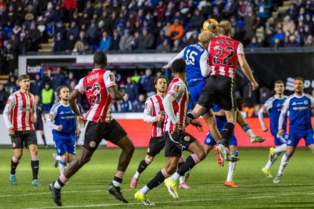 16th February 2026; Leasing Com Stadium, Macclesfield, Cheshire, England; FA Cup Football, Macclesfield versus Brentford; Cameron Borthwick-Jackson of Macclesfield heads the ball  TimxWilliams Content restricted for UK based newspaper