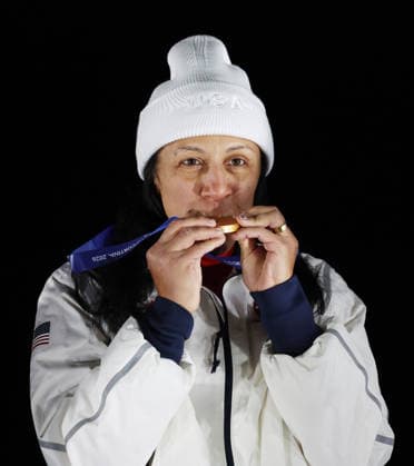 Team USA s Elana Meyers Taylor celebrates winning the gold medal in the Women s Monobob at the 2026 Winter Olympics in Cortina, Italy on Monday February 16, 2026.  OLY20260216630 HUGOxPHILPOTT