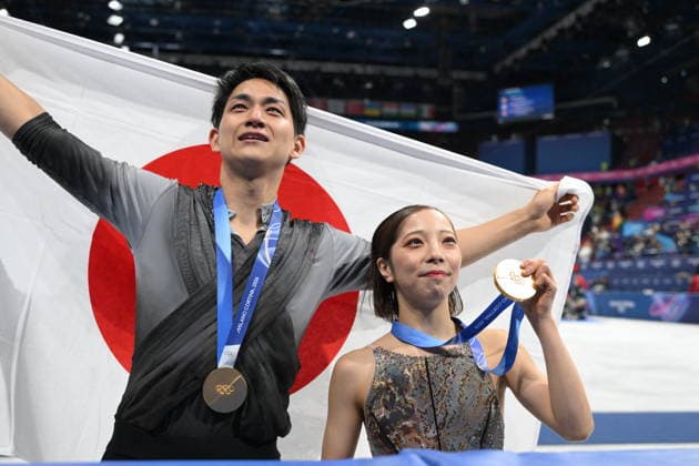 Winter Olympics - Team Japan Wins Gold At Pair Skating Free Figure skating, Eiskunstlauf Gold medalists Riku Miura and partner Ryuichi Kihara of Team Japan pose for a photo after the medal ceremony for the Pair Skating - Free Skating on day ten of the Milano Cortina 2026 Winter Olympic Games, Olympische Spiele, Olympia, OS at Milano Ice Skating Arena on February 16, 2026 in Milan, Italy. Photo by JMP ABACAPRESS.COM Milan Italy  Copyright: xJMP ABACAx