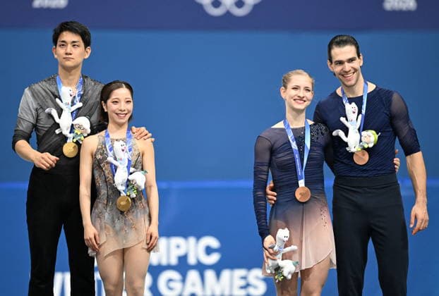 Winter Olympics - Podium of Pair Skating Free Figure skating, Eiskunstlauf Gold Medallists Riku Miura and Ryuichi Kihara of Team Japan and Bronze Medallists Minerva Fabienne Hase and Nikita Volodin of Team Germany pose during the medal ceremony of the figure skating pair skating free skating final during the Milano Cortina 2026 Winter Olympic Games, Olympische Spiele, Olympia, OS at Milano Ice Skating Arena in Milan, Italy on February 16, 2026. Photo by JMP ABACAPRESS.COM Milan Italy  Copyright: xJMP ABACAx