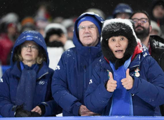 LIVIGNO, ITALY - FEBRUARY 16: Former IOC President Thomas Bach, Eileen Gu s Mom Yan Gu react during the Women s Freeski Big Air Final on day ten of the Milano Cortina 2026 Winter Olympic Games, Olympische Spiele, Olympia, OS at Livigno Snow Park on February 16, 2026 in Livigno, Italy.  Copyright: xCHINASPORTSx 111621938870
