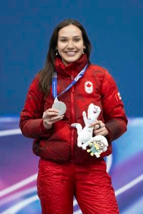 16th February 2026; Milan, Italy, 2026 Winter Olympic Games, Olympische Spiele, Olympia, OS Day Eleven; Women s 1000m Short Track: Courtney Sarault of Team Canada celebrates her silver medal  BestxImages Content restricted for UK based newspaper