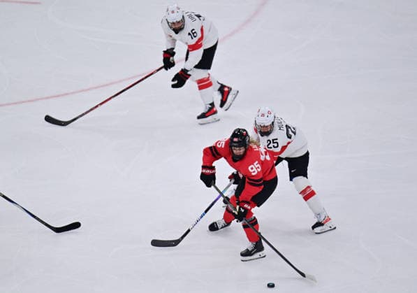 (260217) -- MILAN, Feb. 17, 2026 -- Switzerland s Alina Muller(25) battles for the puck with Canada s Daryl Watts during the Play-offs Semifinals match between Canada and Switzerland of Ice hockey, Eishockey Women at the Milan-Cortina 2026 Olympic Winter games, Winterspiele,Spiele, Summer games in Milan, Italy, Feb. 16, 2026. ) (MICO2026)ITALY-MILAN-OLYMPIC WINTER GAMES-ICE HOCKEY-WOMEN-PLAY-OFFS SEMIFINALS-CAN VS SUI TaoxXiyi 