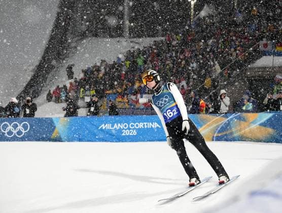 Milan Cortina Olympics: Ski jumping, Skispringen, Ski, nordisch Domen Prevc of Slovenia is pictured after completing his jump during the final round in the men s ski jumping super team competition on Feb. 16, 2026, before it was cancelled due to heavy snowfall at the Milan Cortina Olympics at Predazzo Ski Jumping Stadium in Predazzo, Italy, on Feb. 16, 2026.  A14AA0005295790P