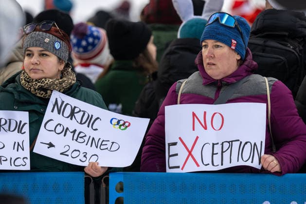 OLYMPICS - Winter Olympic Games, Olympische Spiele, Olympia, OS Milano Cortina 2026 PREDAZZO,ITALY,17.FEB.26 - OLYMPICS, NORDIC SKIING, NORDIC COMBINED, Ski jumping, Skispringen, Ski, nordisch - Winter Olympic Games Milano Cortina 2026, large hill. Image shows specators with banners.  GEPAxpictures xOliverxLerch