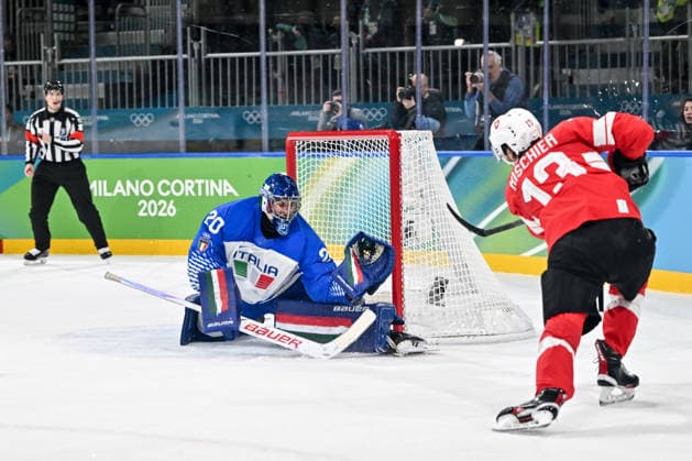 17 02 2026, Milano, Rho Ice hockey, Eishockey Arena, Winter Olympics: Switzerland - Italy (Ice Hockey), goalkeeper Damian Clara of Italy makes a save on Nico Hischier of Switzerland Milano Rho Ice Hockey Arena Lombardy Italy *** 17 02 2026, Milano, Rho Ice Hockey Arena, Winter Olympics Switzerland Italy Ice Hockey , goalkeeper Damian Clara of Italy makes a save on Nico Hischier of Switzerland Milano Rho Ice Hockey Arena Lombardy Italy Copyright: xJustPictures.ch AndreaxBrancax jp-en-AnBr-AB-AAB_025417022026