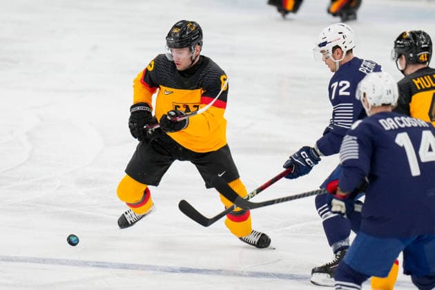 Parker Tuomie (Germany) udn Jordann Perret (France) battle for the puck during the Ice hockey, Eishockey Men - Qualification Play-off match between Germany v France on day eleven of the Milano Cortina 2026 Winter Olympic Games, Olympische Spiele, Olympia, OS at Milano Santagiulia IHO Ice Hockey Arena on February 17, 2026 in Milan, Italy. (Photo by Alex Gottschalk DeFodi Images) - *** Parker Tuomie Germany and Jordann Perret France battle for the puck during the Ice Hockey Men Qualification Play off match between Germany v France on day eleven of the Milano Cortina 2026 Winter Olympic games at Milano Santagiulia IHO Ice Hockey Arena on February 17, 2026 in Milan, Italy Photo by Alex Gottschalk DeFodi Images