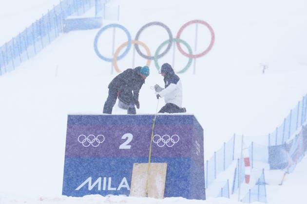 February 17, 2026, Livigno, Italy: Crew members work on the course as heavy snow falls, cancelling the women s aerials qualification at the 2026 Winter Olympics, in Livigno, Italy, Tuesday, Feb. 17, 2026. Canada News - February 17, 2026  - ZUMAc35_ 20260217_zaf_c35_001 Copyright: xSeanxKilpatrickx