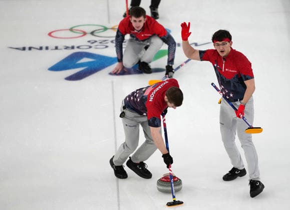 (260217) -- CORTINA D AMPEZZO, Feb. 17, 2026 -- Ben Richardson (L) and Aidan Oldenburg (R) of the United States compete during the curling men s round robin session 9 match between China and the United States at the 2026 Milan-Cortina Winter Olympics in Cortina, Italy, Feb. 17, 2026. ) (MICO2026)ITALY-CORTINA D AMPEZZO-OLYMPIC Winter games, Winterspiele,Spiele, Summer games CURLING-MEN-ROUND ROBIN-CHN VS USA LixGang 