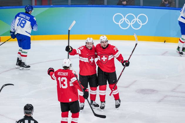 (260217) -- MILAN, Feb. 17, 2026 -- Players of Switzerland celebrate scoring during the Ice hockey, Eishockey men s qualification play-off match between Switzerland and Italy at the Milan-Cortina 2026 Olympic Winter games, Winterspiele,Spiele, Summer games in Milan, Italy, Feb. 17, 2026. ) (MICO2026)ITALY-MILAN-OLYMPIC WINTER GAMES-ICE HOCKEY-MEN-QUALIFICATION PLAY-OFF-SUI VS ITA SunxFei 