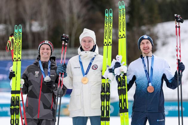 OLYMPICS - Winter Olympic Games, Olympische Spiele, Olympia, OS Milano Cortina 2026 TESERO,ITALY,17.FEB.26 - OLYMPICS, NORDIC SKIING, NORDIC COMBINED, CROSS COUNTRY - Winter Olympic Games Milano Cortina 2026, 10km Gundersen, medal ceremony. Image shows the rejoicing of Johannes Lamparter (AUT), Jens Luraas Oftebro (NOR) and Ikka Herola (FIN). Keywords: medal.  GEPAxpictures xMatthiasxTrinkl