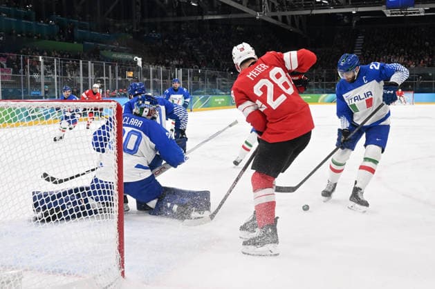 MEIER Timo (SUI) and LARKIN Thomas (ITA) during Ice hockey, Eishockey Olympic Winter games, Winterspiele,Spiele, Summer games Milano-Cortina 2026 in Milano, Italy, February 17 2026  Copyright: xFilippoxTomasi IPAxSportx xipa-agency.netx xx IPA_71642543 IPA_Agency_IPA71642543