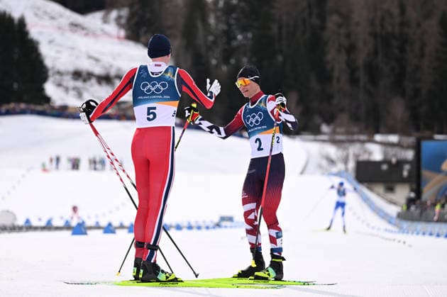 (260217) -- TESERO, Feb. 17, 2026 -- Jens Luraas Oftebro (L) of Norway greets Johannes Lamparter of Austria after the cross-country event of Nordic Combined Individual Gundersen Large Hill 10km at the Milan-Cortina 2026 Olympic Winter games, Winterspiele,Spiele, Summer games in Tesero, Italy, Feb. 17, 2026. ) (MICO2026)ITALY-TESERO-OLYMPIC WINTER GAMES-NORDIC COMBINED-INDIVIDUAL GUNDERSEN LARGE HILL 10KM HexCanling 