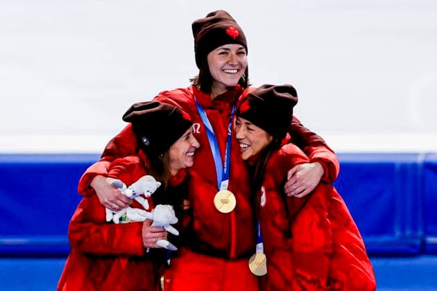 winner team of Canada, Ivanie Blondin of Canada and Valerie Maltais of Canada and Isabelle Weidemann of Canada smiling during the medal ceremony after Women s Team Pursuit Finals, Milano Cortina 2026 Winter Olympics: Day 11, Speed skating, Eisschnelllauf - Milano Cortina 2026 Winter Olympics: Day 11, Milano Speed Skating Stadium, February 17, 2026, Milan, Italy.