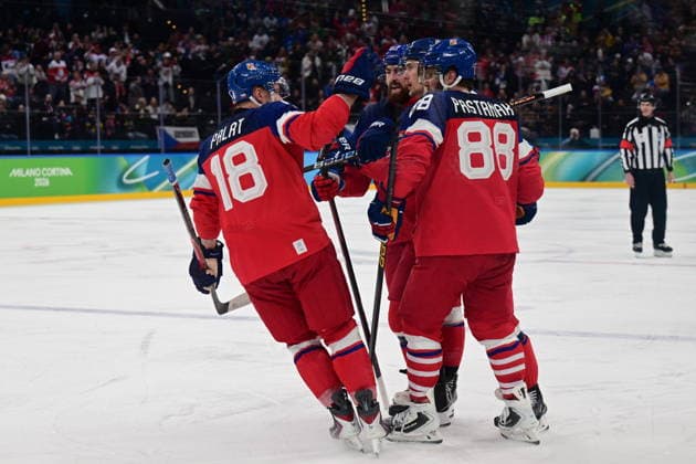XXV Winter Olympic Games, Olympische Spiele, Olympia, OS in Milan, Italy, on February 17, 2026. Men s Ice hockey, Eishockey preliminary round playoffs, Czechia - Denmark. Martin Necas of the Czech Republic (second from right) receives congratulations from his teammates on his first goal. (CTKxPhoto MichalxKamaryt) CTKPhotoP2026021706897  CTKPhotoP2026021706897
