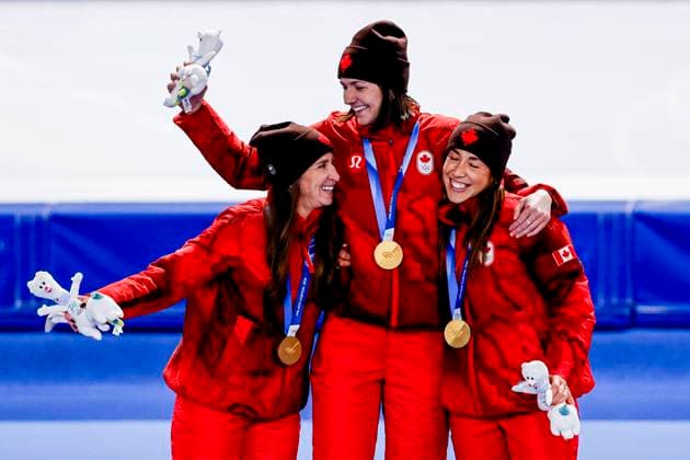 winner team of Canada, Ivanie Blondin of Canada and Valerie Maltais of Canada and Isabelle Weidemann of Canada smiling during the medal ceremony after Women s Team Pursuit Finals, Milano Cortina 2026 Winter Olympics: Day 11, Speed skating, Eisschnelllauf - Milano Cortina 2026 Winter Olympics: Day 11, Milano Speed Skating Stadium, February 17, 2026, Milan, Italy.