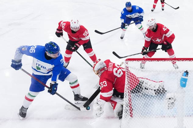 (260217) -- MILAN, Feb. 17, 2026 -- Cristiano Digiacinto (L) of Italy competes during the Ice hockey, Eishockey men s qualification play-off match between Switzerland and Italy at the Milan-Cortina 2026 Olympic Winter games, Winterspiele,Spiele, Summer games in Milan, Italy, Feb. 17, 2026. ) (MICO2026)ITALY-MILAN-OLYMPIC WINTER GAMES-ICE HOCKEY-MEN-QUALIFICATION PLAY-OFF-SUI VS ITA TaoxXiyi 
