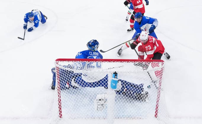 (260217) -- MILAN, Feb. 17, 2026 -- Sandro Schmid (R) of Switzerland competes during the Ice hockey, Eishockey men s qualification play-off match between Switzerland and Italy at the Milan-Cortina 2026 Olympic Winter games, Winterspiele,Spiele, Summer games in Milan, Italy, Feb. 17, 2026. ) (MICO2026)ITALY-MILAN-OLYMPIC WINTER GAMES-ICE HOCKEY-MEN-QUALIFICATION PLAY-OFF-SUI VS ITA TaoxXiyi 