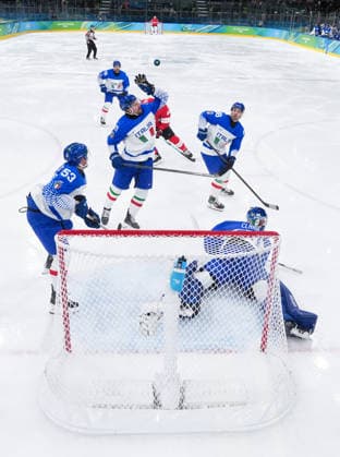 (260217) -- MILAN, Feb. 17, 2026 -- Mats Frycklund (C) of Italy catches the puck during the Ice hockey, Eishockey men s qualification play-off match between Switzerland and Italy at the Milan-Cortina 2026 Olympic Winter games, Winterspiele,Spiele, Summer games in Milan, Italy, Feb. 17, 2026. ) (MICO2026)ITALY-MILAN-OLYMPIC WINTER GAMES-ICE HOCKEY-MEN-QUALIFICATION PLAY-OFF-SUI VS ITA TaoxXiyi 