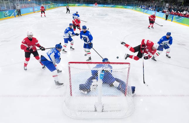 (260217) -- MILAN, Feb. 17, 2026 -- Nino Niederreiter (2nd R, front) of Switzerland shoots during the Ice hockey, Eishockey men s qualification play-off match between Switzerland and Italy at the Milan-Cortina 2026 Olympic Winter games, Winterspiele,Spiele, Summer games in Milan, Italy, Feb. 17, 2026. ) (MICO2026)ITALY-MILAN-OLYMPIC WINTER GAMES-ICE HOCKEY-MEN-QUALIFICATION PLAY-OFF-SUI VS ITA TaoxXiyi 