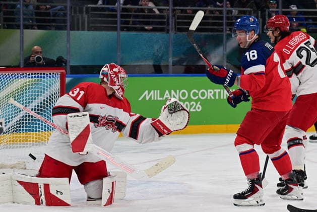 XXV Winter Olympic Games, Olympische Spiele, Olympia, OS in Milan, Italy, on February 17, 2026. Men s Ice hockey, Eishockey preliminary round playoffs, Czechia - Denmark. Frederik Andersen of Denmark scores the first goal. Ondrej Palat of the Czech Republic and Oliver Lauridsen of Denmark watch from the left. Goal scorer Martin Necas of the Czech Republic. (CTKxPhoto MichalxKamaryt) CTKPhotoP2026021706948  CTKPhotoP2026021706948