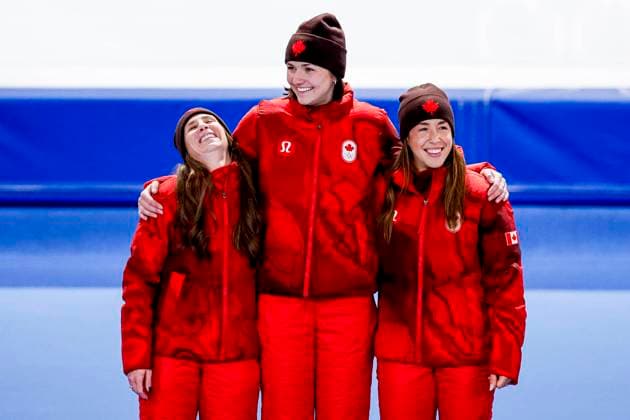 winner team of Canada, Ivanie Blondin of Canada and Valerie Maltais of Canada and Isabelle Weidemann of Canada smiling during the medal ceremony after Women s Team Pursuit Finals, Milano Cortina 2026 Winter Olympics: Day 11, Speed skating, Eisschnelllauf - Milano Cortina 2026 Winter Olympics: Day 11, Milano Speed Skating Stadium, February 17, 2026, Milan, Italy.
