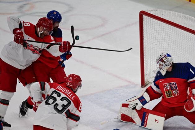 XXV Winter Olympic Games, Olympische Spiele, Olympia, OS in Milan, Italy, on February 17, 2026. Men s Ice hockey, Eishockey preliminary round playoffs, Czechia - Denmark. From left Nicholas B. Jensen of Denmark, Filip Hronek of the Czech Republic, Patrick Russell of Denmark, goalie Lukas Dostal of the Czech Republic. (CTKxPhoto MichalxKamaryt) CTKPhotoP2026021707728  CTKPhotoP2026021707728