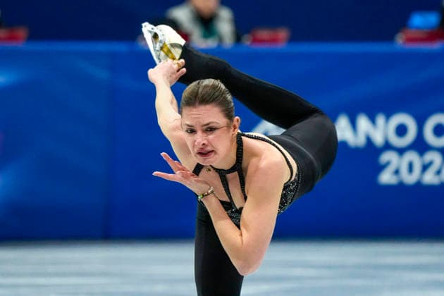 Kristen Spours of Great Britain performs during the Women s Single Skating Short Program at the Milano Figure skating, Eiskunstlauf Stadium in Milan, Italy on Tuesday, February 17, 2026.  OLY20260217111 RICHARDxELLIS