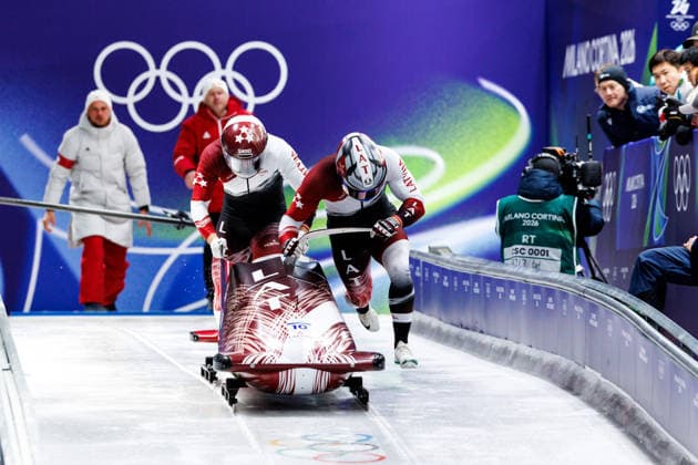 OLYMPICS - Winter Olympic Games, Olympische Spiele, Olympia, OS Milano Cortina 2026 CORTINA D AMPEZZO,ITALY,17.FEB.26 - OLYMPICS, BOBSLEIGH - Winter Olympic Games Milano Cortina 2026, 2-man, men. Image shows Jekabs Kalenda and Matiss Miknis (LAT).  GEPAxpictures xMaticxKlansek