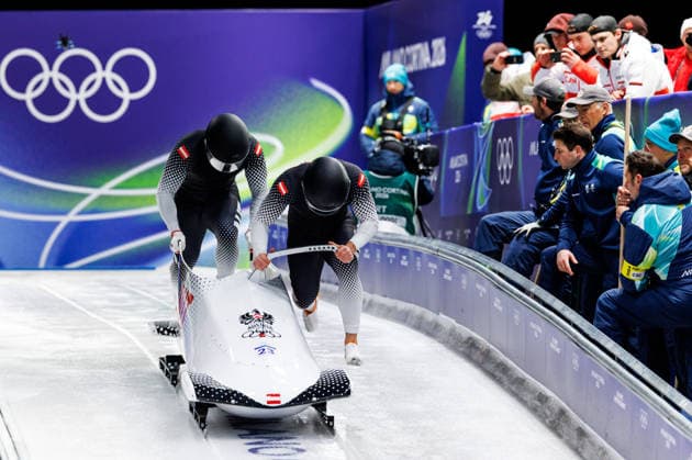 OLYMPICS - Winter Olympic Games, Olympische Spiele, Olympia, OS Milano Cortina 2026 CORTINA D AMPEZZO,ITALY,17.FEB.26 - OLYMPICS, BOBSLEIGH - Winter Olympic Games Milano Cortina 2026, 2-man, men. Image shows Jakob Mandlbauera and Daiyehan-Obafemi Nichols-Bardi (AUT).  GEPAxpictures xMaticxKlansek