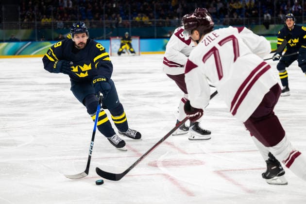 260217 Filip Forsberg of Sweden and Kristaps Roberts Zile of Latvia in the men s Ice hockey, Eishockey qualification playoffs game between Sweden and Latvia during day 11 of the 2026 Winter Olympics on February 17, 2026 in Milan. Photo: Emma Wallskog BILDBYRAN kod EW CS0885 ishockey ice hockey Olympic Games, Olympische Spiele, Olympia, OS olympics winter olympics os ol olympiska spel vinter-os olympiske leker milano cortina 2026 milan cortina 2026 milano cortina 2026 olympic games milano cortina 2026 winter olympic games milano cortina-os milano cortina-ol vinter-ol 11 bbeng sverige sweden latvia lettland *** 260217 Filip Forsberg of Sweden and Kristaps Roberts Zile of Latvia in the men s ice hockey qualification playoffs game between Sweden and Latvia during day 11 of the 2026 Winter Olympics on February 17, 2026 in Milan Photo Emma Wallskog BILDBYRAN kod EW CS0885 ishockey ice hockey olympic games olympics winter olympics os ol olympiska spel vinter os olympiske leker milano cortina 2026 milan cortina 2026 milano cortina 2026 olympic games milano cortina 2026 winter olympic games milano cortina os milano cortina ol vinter ol 11 bbeng sverige sweden latvia lettland  Copyright: EMMAxWALLSKOG BB260217EW008