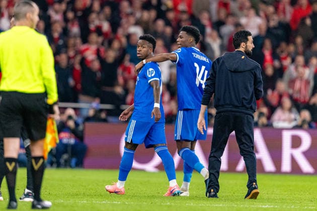 Vinicius Vini Jr and Aurelien Tchouameni seen during Champions League play off game between SL Benfica and Real Madrid CF (Maciej Rogowski Ball Raw Images) Lisbon Estadio da Luz Portugal Copyright: xMaciejxRogowskix ROG_BENvsRMA-176