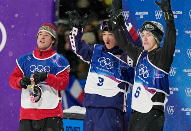 Gold medalist Tormod Frostad of Norway (R), silver medalist Mac Forehand of the United States (C), and bronze medalist Matej Svancer of Austria react in the finish area after seeing the final scores in the Men s Freestyle Skiing Big Air competition at the Milano Cortina 2026 Winter Olympic Games, Olympische Spiele, Olympia, OS in Livigno, Italy, on Tuesday, February 17, 2026.  OLY20260217806 BOBxSTRONG