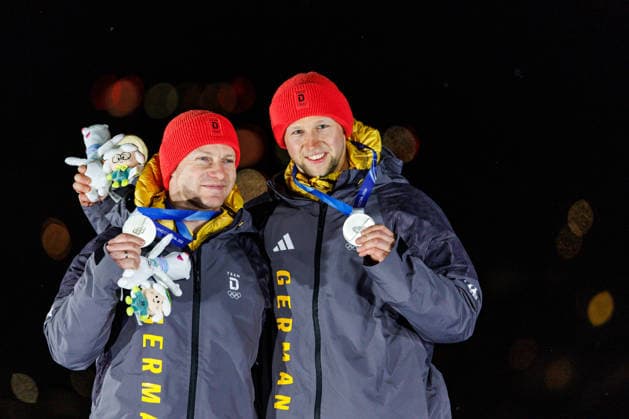 OLYMPICS - Winter Olympic Games, Olympische Spiele, Olympia, OS Milano Cortina 2026 CORTINA D AMPEZZO,ITALY,17.FEB.26 - OLYMPICS, BOBSLEIGH - Winter Olympic Games Milano Cortina 2026, 2-man, men, medal ceremony. Image shows the rejoicing of Francesco Friedrich and Alexander Schuller (GER). Keywords: medal.  GEPAxpictures xMaticxKlansek