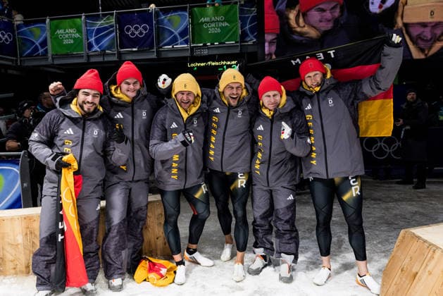 CORTINA, ITALY - FEBRUARY 17: The podium - Bronze medalists Adam Ammour and Alexander Schaller (Germany), Gold medalists Johannes Lochner and Georg Fleischhauer (Germany), Silver medalists Francesco Friedrich and Alexander Schueller (Germany) - pose together during the Bobsleigh 2-man at the Milano Cortina 2026 Olympics at Cortina Sliding Centre on day 11 of the Milano Cortina 2026 Olympics on February 17, 2026 in Cortina, Italy. Editorial use only. Italy Copyright: xSteffiexWunderlx