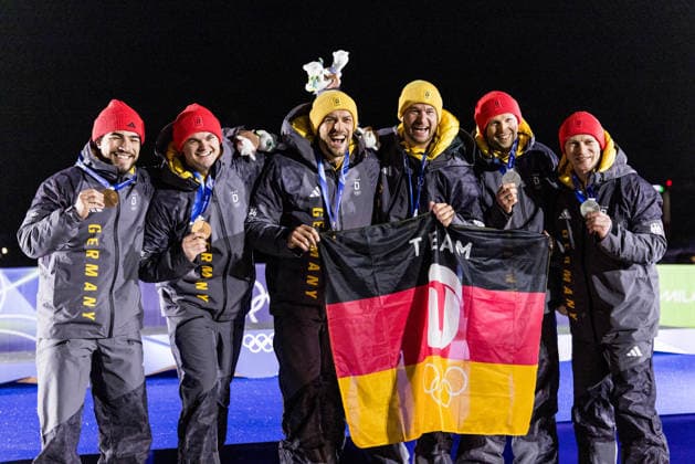 CORTINA, ITALY - FEBRUARY 17: The podium posing together - Bronze medalists Adam Ammour and Alexander Schaller (Germany), Gold medalists Johannes Lochner and Georg Fleischhauer (Germany), Silver medalists Francesco Friedrich and Alexander Schueller (Germany) - during the Bobsleigh 2-man medal ceremony at the Milano Cortina 2026 Olympics at Cortina Sliding Centre on day 11 of the Milano Cortina 2026 Olympics on February 17, 2026 in Cortina, Italy. Editorial use only. Italy Copyright: xSteffiexWunderlx