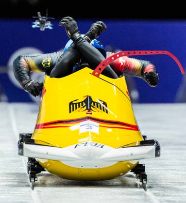 February 17, 2026, Cortina d Ampezzo, Italy: ADAM AMMOUR and ALEXANDER SCHALLER of Germany guide their sled to a bronze medal in the men s 2-man bobsleigh event at the 2026 Milano Cortina Winter Olympics. Cortina D ampezzo Italy - ZUMAsc5_ 20260217_oly_sc5_006 Copyright: xErichxSchlegelx