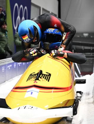 (260218) -- CORTINA D AMPEZZO, Feb. 18, 2026 -- Johannes Lochner (front) Georg Fleischhauer of Germany celebrate after winning the Bobsleigh 2-man at the Milan-Cortina 2026 Olympic Winter games, Winterspiele,Spiele, Summer games in Cortina D Ampezzo, Italy, Feb. 17, 2026. ) (MICO2026)ITALY-CORTINA D AMPEZZO-OLYMPIC WINTER GAMES-BOBSLEIGH-2-MAN LianxYi 