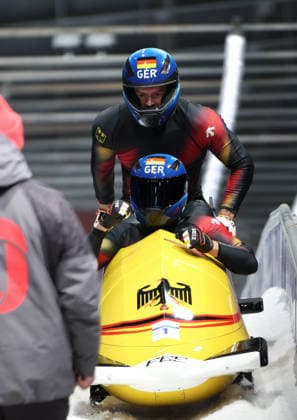 (260218) -- CORTINA D AMPEZZO, Feb. 18, 2026 -- Johannes Lochner (front) Georg Fleischhauer of Germany celebrate after winning the Bobsleigh 2-man at the Milan-Cortina 2026 Olympic Winter games, Winterspiele,Spiele, Summer games in Cortina D Ampezzo, Italy, Feb. 17, 2026. ) (MICO2026)ITALY-CORTINA D AMPEZZO-OLYMPIC WINTER GAMES-BOBSLEIGH-2-MAN DingxXu 