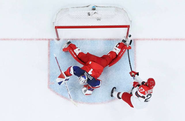 260217 -- MILAN, Feb. 17, 2026 -- Oliver Bjorkstrand R of Denmark shoots during the Ice hockey, Eishockey men s qualification play-off match between the Czech Republic and Denmark at the Milan-Cortina 2026 Olympic Winter games, Winterspiele,Spiele, Summer games in Milan, Italy, Feb. 17, 2026. MICO2026ITALY-MILAN-OLYMPIC WINTER GAMES-ICE HOCKEY-MEN-QUALIFICATION PLAY-OFF-CZE VS DEN ZhangxHaofu  (MICO2026)ITALY-MILAN-OLYMPIC WINTER GAMES-ICE HOCKEY-MEN-QUALIFICATION PLAY-OFF-CZE VS DEN IMAGO ZhangxHaofu  imago images 0847873966