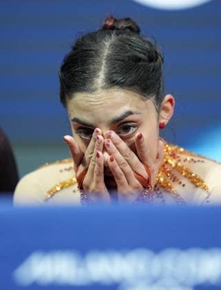 260217 -- MILAN, Feb. 17, 2026 -- Madeline Schizas of Canada reacts after the short program match of Figure skating, Eiskunstlauf women single skating at the Milan-Cortina 2026 Olympic Winter games, Winterspiele,Spiele, Summer games in Milan, Italy, Feb. 17, 2026. MICO2026ITALY-MILAN-OLYMPIC WINTER GAMES-FIGURE SKATING-WOMEN SINGLE SKATING-SHORT PROGRAM XuexYuge  (MICO2026)ITALY-MILAN-OLYMPIC WINTER GAMES-FIGURE SKATING-WOMEN SINGLE SKATING-SHORT PROGRAM IMAGO XuexYuge  imago images 0847877501
