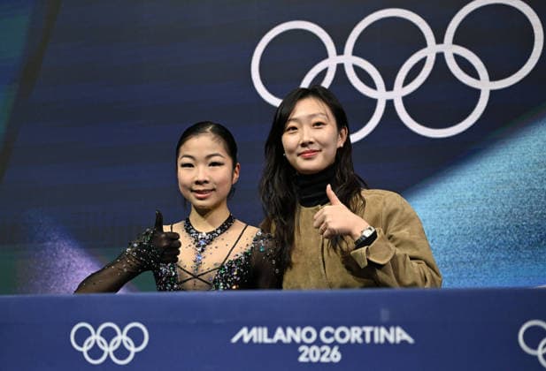 260217 -- MILAN, Feb. 17, 2026 -- Zhang Ruiyang L of China waits for her score after the short program match of Figure skating, Eiskunstlauf women single skating at the Milan-Cortina 2026 Olympic Winter games, Winterspiele,Spiele, Summer games in Milan, Italy, Feb. 17, 2026. MICO2026ITALY-MILAN-OLYMPIC WINTER GAMES-FIGURE SKATING-WOMEN SINGLE SKATING-SHORT PROGRAM ChengxMin  (MICO2026)ITALY-MILAN-OLYMPIC WINTER GAMES-FIGURE SKATING-WOMEN SINGLE SKATING-SHORT PROGRAM IMAGO ChengxMin  imago images 0847878903