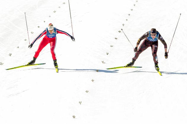 Winter Olympics in Milan Cortina 2026 Val di Fiemme, Italy 20260218. Julie Bjervig Drivenes from Norway and Coletta Rydzek from Germany during the cross-country team sprint on Lago di Tesero during the Winter Olympics in Milano Cortina 2026. Photo: Lise Aaserud NTB Val di Fiemme Italy EDITORIAL USE ONLY. RESTRICTED USE FOR BETTING COMPANIES Ref:_SPOdJbtjjq0RNQ.jpg *** Winter Olympics in Milan Cortina 2026 Val di Fiemme, Italy 20260218 Julie Bjervig Drivenes from Norway and Coletta Rydzek from Germany during the cross country team sprint on Lago di Tesero during the Winter Olympics in Milano Cortina 2026 Photo Lise Aaserud NTB Val di Fiemme Italy EDITORIAL USE ONLY RESTRICTED USE FOR BETTING COMPANIES  Copyright: xLisexAserudx xNTBx