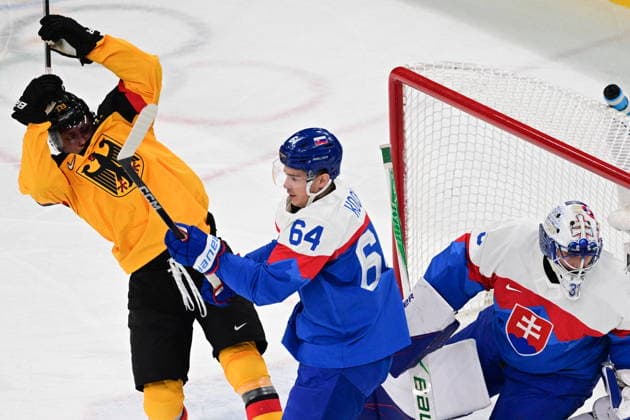 XXV Winter Olympic Games, Olympische Spiele, Olympia, OS in Milan, Italy, on February 18, 2026. Men s Ice hockey, Eishockey preliminary round playoffs, Slovakia - Germany. (L-R) Tim Stutzle of Germany, Patrik Koch of Slovakia and goalkeeper Samuel Hlavaj of Slovakia. (CTKxPhoto MichalxKamaryt) CTKPhotoP2026021804022  CTKPhotoP2026021804022