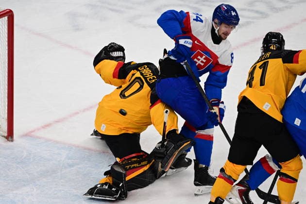 XXV Winter Olympic Games, Olympische Spiele, Olympia, OS in Milan, Italy, on February 18, 2026. Men s Ice hockey, Eishockey preliminary round playoffs, Slovakia - Germany. Pavol Regenda of Slovakia, center, scores a goal. At left goalkeeper Philipp Grubauer of Germany, at right Jonas Muller of Germany. (CTKxPhoto MichalxKamaryt) CTKPhotoP2026021804288  CTKPhotoP2026021804288