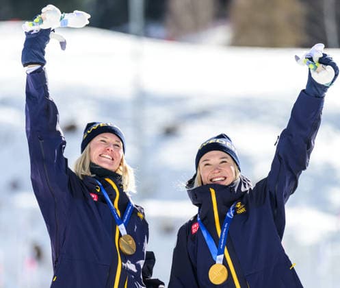 260218 Maja Dahlqvist of Sweden and Jonna Sundling of Sweden celebrate first place in the women s free technique team sprint cross-country skiing final during day 12 of the 2026 Winter Olympics on February 18, 2026 in Val di Fiemme. Photo: Jon Olav Nesvold BILDBYRAN COP 217 MT0994 skidor cross-country skiing langrenn Olympic Games, Olympische Spiele, Olympia, OS olympics winter olympics os ol olympiska spel vinter-os olympiske leker milano cortina 2026 milan cortina 2026 milano cortina 2026 olympic games milano cortina 2026 winter olympic games milano cortina-os milano cortina-ol vinter-ol 12 bbeng teamsprint sweden sverige jubel *** 260218 Maja Dahlqvist of Sweden and Jonna Sundling of Sweden celebrate first place in the women s free technique team sprint cross country skiing final during day 12 of the 2026 Winter Olympics on February 18, 2026 in Val di Fiemme Photo Jon Olav Nesvold BILDBYRAN COP 217 MT0994 skidor cross country skiing langrenn olympic games olympics winter olympics os ol olympiska spel vinter os olympiske leker milano cortina 2026 milan cortina 2026 milano cortina 2026 olympic games milano cortina 2026 winter olympic games milano cortina os milano cortina ol vinter ol 12 bbeng teamsprint sweden sverige jubel  Copyright: JONxOLAVxNESVOLD BB260218JE073