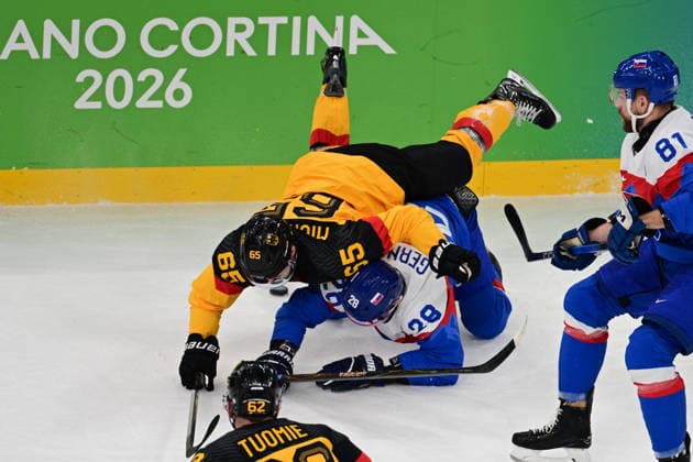 XXV Winter Olympic Games, Olympische Spiele, Olympia, OS in Milan, Italy, on February 18, 2026. Men s Ice hockey, Eishockey preliminary round playoffs, Slovakia - Germany. (L-R) Marc Michaelis of Germany, Martin Gernat of Slovakia, Parker Tuomie of Germany and Erik Cernak of Slovakia. (CTKxPhoto MichalxKamaryt) CTKPhotoP2026021804320  CTKPhotoP2026021804320