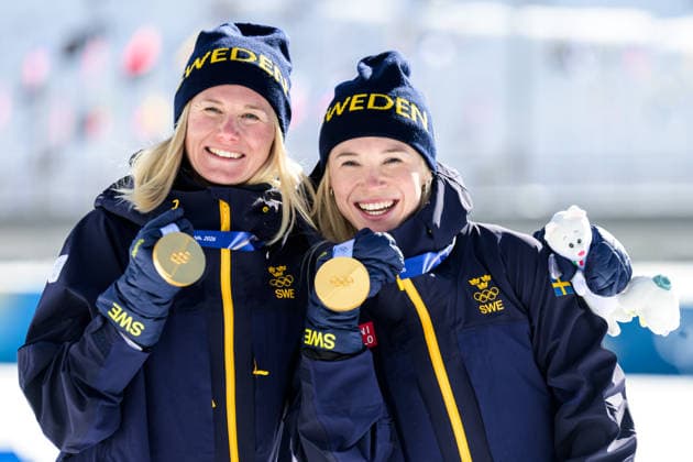 260218 Maja Dahlqvist of Sweden and Jonna Sundling of Sweden celebrate with gold medals after women s free technique team sprint cross-country skiing final during day 12 of the 2026 Winter Olympics on February 18, 2026 in Val di Fiemme. Photo: Jon Olav Nesvold BILDBYRAN COP 217 MT0993 skidor cross-country skiing langrenn Olympic Games, Olympische Spiele, Olympia, OS olympics winter olympics os ol olympiska spel vinter-os olympiske leker milano cortina 2026 milan cortina 2026 milano cortina 2026 olympic games milano cortina 2026 winter olympic games milano cortina-os milano cortina-ol vinter-ol 12 bbeng teamsprint sweden sverige jubel guld gold *** 260218 Maja Dahlqvist of Sweden and Jonna Sundling of Sweden celebrate with gold medals after women s free technique team sprint cross country skiing final during day 12 of the 2026 Winter Olympics on February 18, 2026 in Val di Fiemme Photo Jon Olav Nesvold BILDBYRAN COP 217 MT0993 skidor cross country skiing langrenn olympic games olympics winter olympics os ol olympiska spel vinter os olympiske leker milano cortina 2026 milan cortina 2026 milano cortina 2026 olympic games milano cortina 2026 winter olympic games milano cortina os milano cortina ol vinter ol 12 bbeng teamsprint sweden sverige jubel guld gold  Copyright: JONxOLAVxNESVOLD BB260218JE082